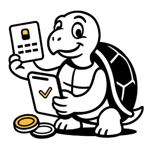 Kilpikonne tabletilla, ja k&auml;dess&auml; pankkikortti sek&auml; edess&auml; kaksi kolikkoa